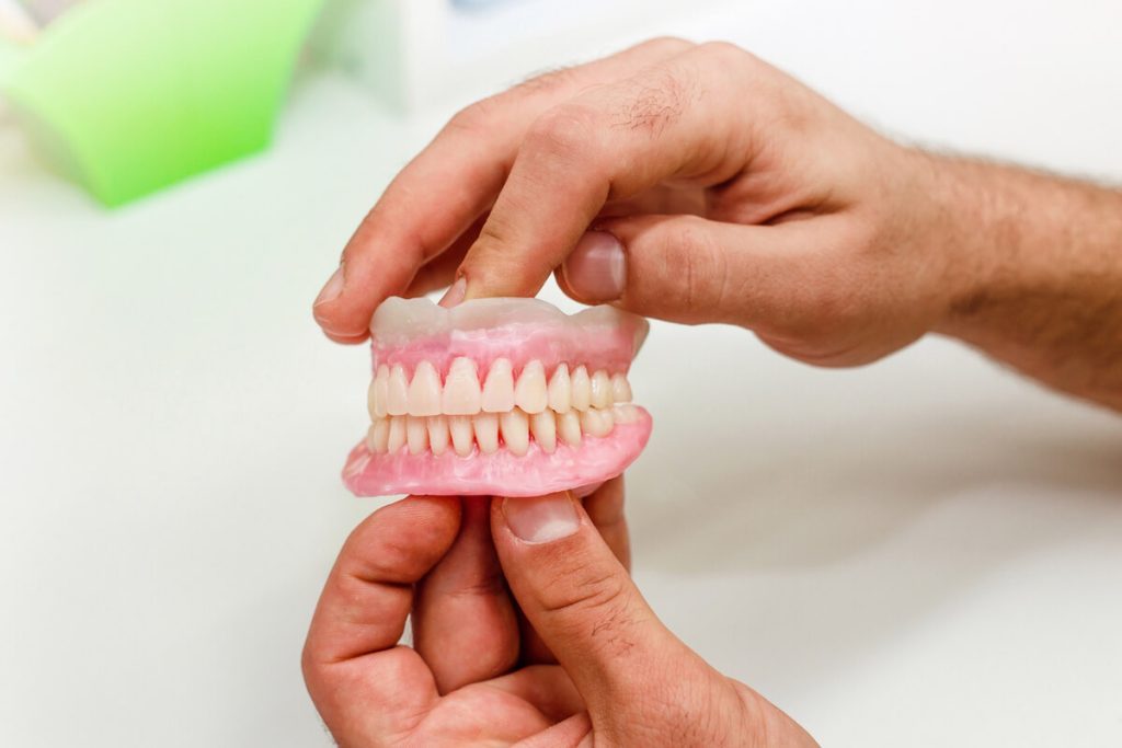 complete vs partial dentures which is right for you